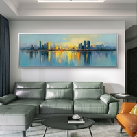 אמנות פנורמית לסלון עם skyline זהוב והשתקפות במים.