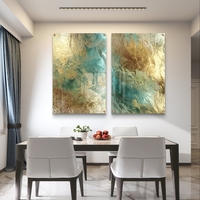 תמונת זכוכית זוגית בעיצוב אבסטרקטי עם שילוב זהב וטורקיז במראה יוקרתי