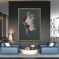 תמונת קנבס פרופיל אישה עם ורד אדום