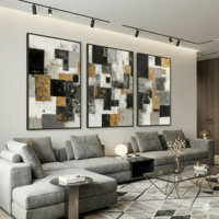 שלישיית תמונות קנבס אבסטרקטיות בגווני אפור שחור וזהב בעיצוב מודרני לסלון יוקרתי
