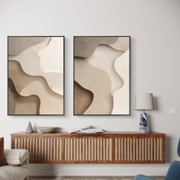 זוג תמונות קנבס בגווני בז ושמנת עם צורות אורגניות רכות