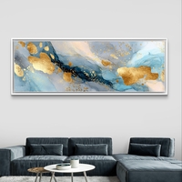 תמונת קנבס פנורמית בגווני כחול עם כתמי זהב בהדפסה חלקה – תכשיט לבית