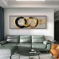 תמונת קנבס פנורמית אבסטרקטית עם מעגלים בגווני שחור וזהב על רקע אפור בעיצוב מודרני ויוקרתי