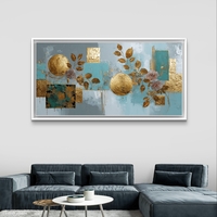 תמונת קנבס לרוחב בעיצוב אבסטרקטי בגווני תכלת וזהב עם אלמנטים גיאומטריים ועלים דקורטיביים לסלון