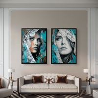 תמונת קנבס זוגית עם דיוקנאות נשיים אמנותיים בגווני טורקיז ושחור עם נגיעות תחרה