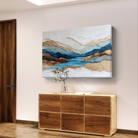 תמונת קנבס אבסטרקטית בגווני כחול ותכלת עם נגיעות זהב בעיצוב יוקרתי