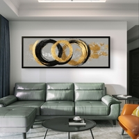 תמונת קנבס פנורמית אבסטרקטית עם מעגלים בגווני שחור וזהב על רקע אפור בעיצוב מודרני ויוקרתי