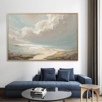 תמונת קנבס של חוף טבעי עם שמיים בתכלת-קרם ועננים מסתחררים – NEXTGEN BY BAR