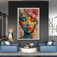 דיוקן נשי אומנותי עם עיניים עצומות ופרח בשיער בגווני טורקיז, זהב ואדמה מודפס על קנבס איכותי