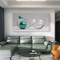 תמונת זכוכית בהדפסה חלקה עם עיצוב אינסוף מתכתי וכדורים מבריקים בגווני טורקיז ולבן, בסגנון מודרני ויוקרתי.