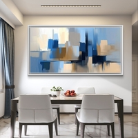 תמונת קנבס לרוחב בעיצוב אבסטרקטי עם מריחות צבע בגווני כחול, שמנת וחול, בסגנון מודרני ורגוע