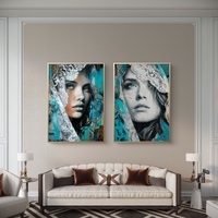 תמונת קנבס זוגית עם דיוקנאות נשיים אמנותיים בגווני טורקיז ושחור עם נגיעות תחרה