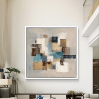 תמונת קנבס אבסטרקט גיאומטרי עם בלוקים בבז׳, שמנת, תכלת וכחול על רקע בהיר