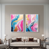 תמונת קנבס זוגית אבסטרקטית בגווני ורוד, תכלת וזהב בעיצוב יוקרתי לסלון