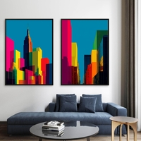 זוג תמונות קנבס אורבניות של ניו־יורק בצבעי ניאון חזקים על רקע כחול – NEXTGEN BY BAR