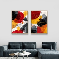 סט תמונות קנבס זוגי בעיצוב אבסטרקט צבעוני בגווני אדום, צהוב, שחור ואפור – תכשיט לבית