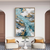 תמונת קנבס אבסטרקטית בגווני תכלת, כחול ולבן עם נגיעות זהב בעיצוב יוקרתי ואלגנטי לבית