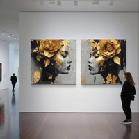 זוג תמונות זכוכית מרובעות עם דמויות נשיות בפרופיל ונגיעות זהב, בעיצוב אמנותי יוקרתי לקיר.