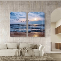 זוג תמונות זכוכית עם ים פתוח וגלים בתנועה עדינה, שמיים בהירים ועיצוב רגוע ואלגנטי לקיר הבית