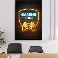 תמונת קנבס עם כיתוב Gaming Zone בעיצוב ניאון ובקר משחק על רקע כהה, מתאימה לחדר גיימינג וחדר נוער