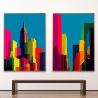 זוג תמונות קנבס אורבניות של ניו־יורק בצבעי ניאון חזקים על רקע כחול – NEXTGEN BY BAR