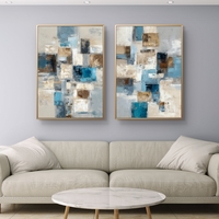 סט תמונות קנבס זוגיות בסגנון אבסטרקט גיאומטרי בגווני כחול, תכלת ובז׳ לעיצוב סלון מודרני