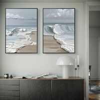 זוג תמונות קנבס גלי ים בגווני תכלת ולבן בעיצוב מודרני