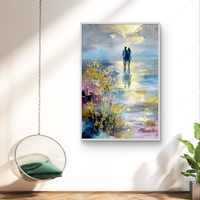 תמונת קנבס אומנותית של זוג עומד מול מים ושמיים בגוונים כחולים וזהב עם מראה ציורי ועדין