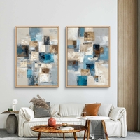 סט תמונות קנבס זוגיות בסגנון אבסטרקט גיאומטרי בגווני כחול, תכלת ובז׳ לעיצוב סלון מודרני
