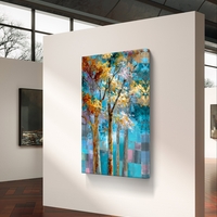 תמונת קנבס עם עצים אמנותיים בגווני תכלת, טורקיז וזהב, בעיצוב מודרני ומרגיע לבית