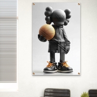 תמונת זכוכית של דמות KAWS שחורה מחזיקה כדורסל, עם נעליים שחורות ושרוכים כתומים – מתוך קולקציית NEXTGEN BY BAR של תכשיט לבית.
