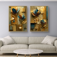 זוג תמונות קנבס פרחוניות בגווני זהב וכחול – דגם DA2223
