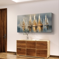 תמונת קנבס לרוחב עם סירות מפרש בגווני כחול ושמנת עם נגיעות זהב, משתקפות במים בעיצוב רגוע ויוקרתי לסלון.