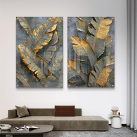 תמונת זכוכית זוגית עם עלים בגווני אפור וזהב בהדפסה חלקה יוקרתית