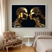 תמונת קנבס לרוחב עם שתי דמויות זהובות סימטריות על רקע שחור בעיצוב מודרני ויוקרתי