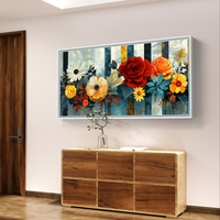 תמונת קנבס לרוחב עם פרחים צבעוניים בגווני אדום, כתום ושמנת על רקע מודרני בגווני כחול וזהב.