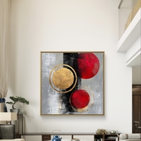 תמונת קנבס מרובעת אבסטרקטית עם עיגולים אדומים וטבעות זהב על רקע אפור ושחור