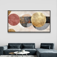 תמונת קנבס לרוחב בעיצוב אבסטרקטי עם מעגלים חופפים בגווני שמנת, זהב ואפור על רקע בהיר.