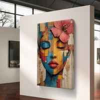 דיוקן נשי אומנותי עם עיניים עצומות ופרח בשיער בגווני טורקיז, זהב ואדמה מודפס על קנבס איכותי