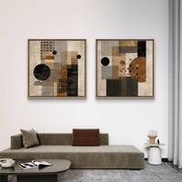 זוג תמונות קנבס מרובעות בעיצוב גאומטרי בגווני חום, בז’ ושחור