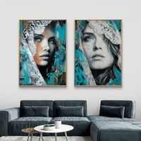 תמונת קנבס זוגית עם דיוקנאות נשיים אמנותיים בגווני טורקיז ושחור עם נגיעות תחרה