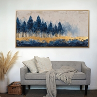 תמונת קנבס של יער עצים כחולים עם נגיעות זהב על רקע בהיר