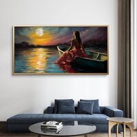 תמונת קנבס של אישה יושבת בסירה מול ירח מלא והשתקפות אור על המים