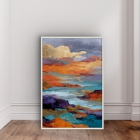 תמונת קנבס אבסטרקטית עם נגיעות זהב וגווני כחול וכתום, בהשראת ים ושקיעה בעיצוב מודרני