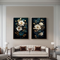 תמונת קנבס זוגית פרחונית בגווני שחור, טורקיז ולבן עם נגיעות זהב יוקרתיות