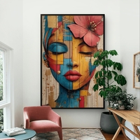 דיוקן נשי אומנותי עם עיניים עצומות ופרח בשיער בגווני טורקיז, זהב ואדמה מודפס על קנבס איכותי