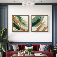 זוג תמונות קנבס מרובעות אבסטרקטיות בגווני ירוק עם נגיעות זהב