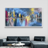 תמונת קיר אבסטרקטית של עיר צבעונית בכחול, צהוב ונגיעות אדום, מראה דרמטי לסלון