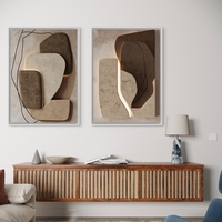 זוג תמונות קנבס בעיצוב מודרני בגווני בז' וחום עם קווים מינימליסטיים – מתוך קולקציית NEXTGEN BY BAR של תכשיט לבית.