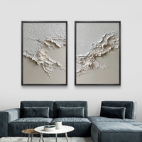 תמונת קנבס זוגית מינימליסטית בגווני לבן ושמנת עם טקסטורה עדינה ומראה רגוע